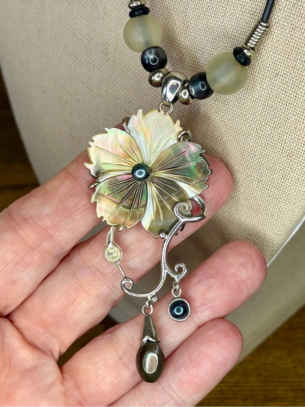 Artisan Mother of Pearl Flower Pendant Necklace on Black Cord - Picture 3 of 8